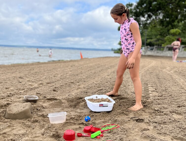 My daughter on the beach at Oneida Lake